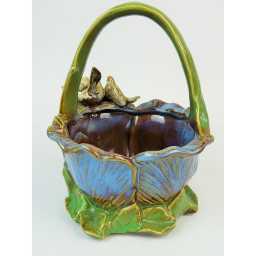 214 - Pretty Majolica posy basket decorated with Doves in a Tulip base, no damage. Approx 9 inches tall. S... 