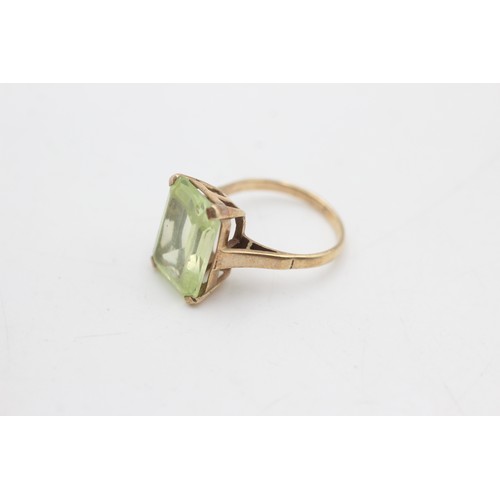 77 - 9ct gold green paste solitaire cocktail ring (3.6g)         5138