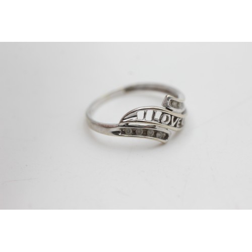 79 - 9ct white gold diamond 'i love you' bypass ring (2.2g)         2460