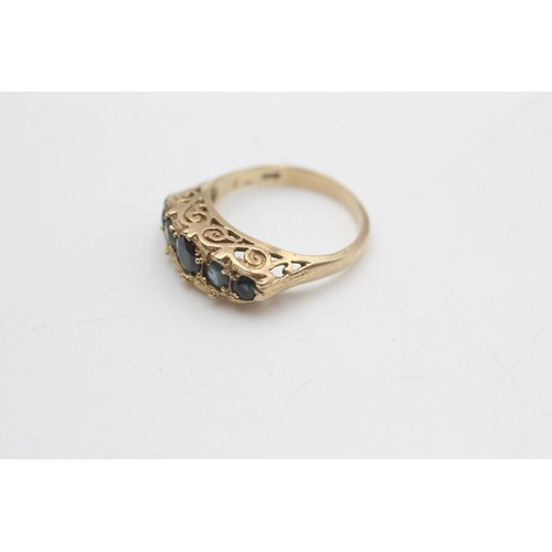 88 - 9ct gold sapphire five stone gypsy set ring (3.3g)         4411