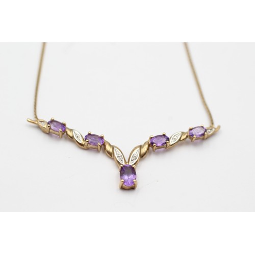 97 - 9ct gold amethyst & diamond static twist pendant necklace (3.9g)         7100