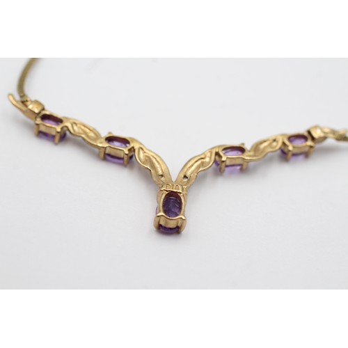 97 - 9ct gold amethyst & diamond static twist pendant necklace (3.9g)         7100