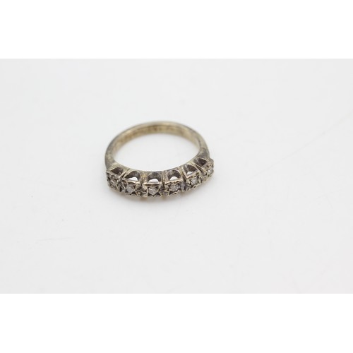 98 - 9ct gold diamond half eternity ring (2.7g)         8624