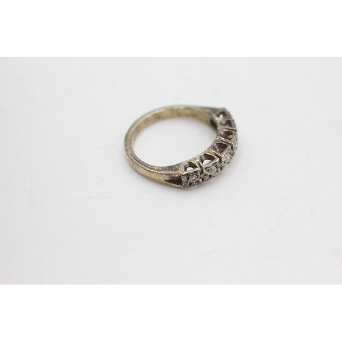 98 - 9ct gold diamond half eternity ring (2.7g)         8624