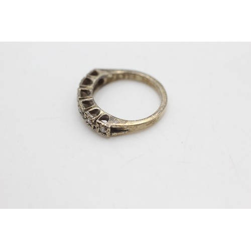 98 - 9ct gold diamond half eternity ring (2.7g)         8624