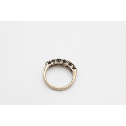 98 - 9ct gold diamond half eternity ring (2.7g)         8624