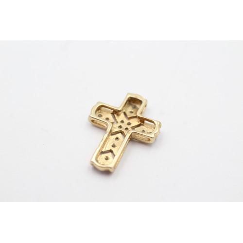 99 - 14ct gold diamond set cross pendant (1.2g)         8971