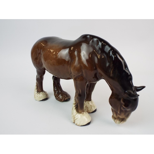 231 - Beswick brown grazing shire horse, Model no 1050.