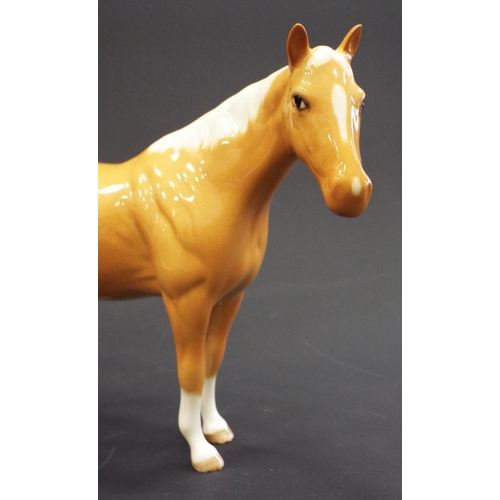 239 - Royal Doulton Palomino pony.