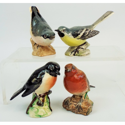 252 - Beswick bird figurines, Nuthatch, Grey wagatil, Stone chat & Robin.