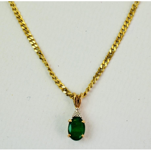 115A - 9ct Gold Pendant set with a Emerald coloured Gem capped with a melee Diamond. Hung on a 9ct Yellow G... 