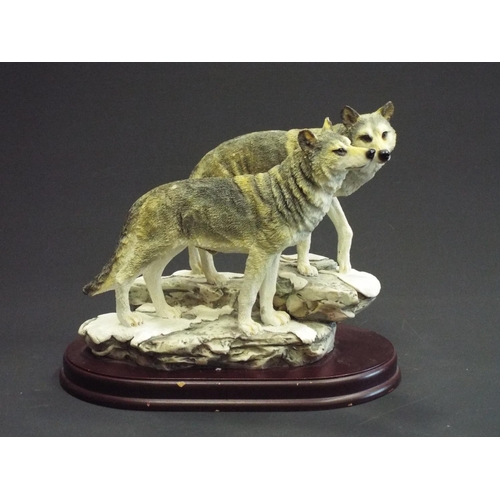 284 - Leonardo collection figurine of a pair of wolves, standing approx 7