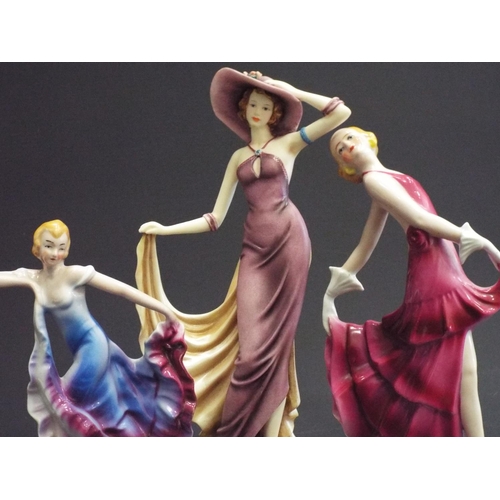 288 - 2 Continental ceramic figurines of dancing ladies plus a Leonardo figurine.