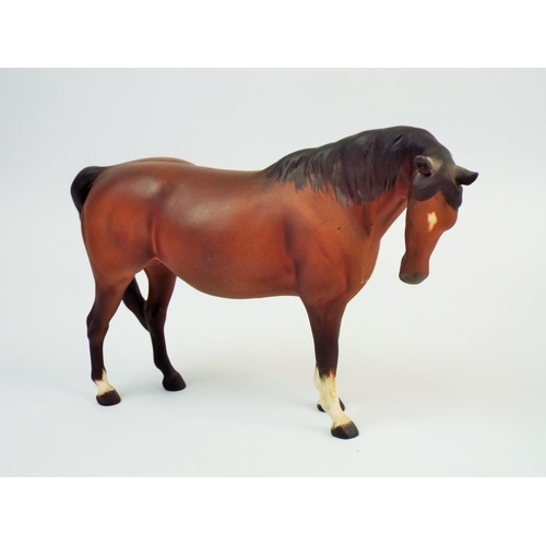 328 - Beswick bay mare in matt finish with head curled to the right.