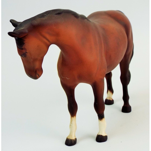 328 - Beswick bay mare in matt finish with head curled to the right.