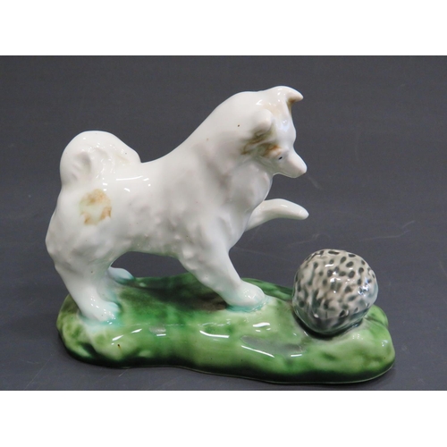 393 - Royal Copenhagen playful West Highland Terrier with slipper (model 145)  together with a Russian mad... 