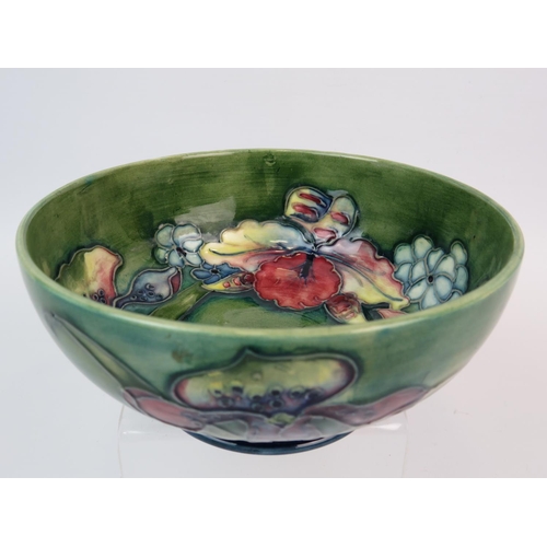 400 - Moorcroft bowl decorated with lillies to inside and out. 3 inches tall and 6 inches wide. Green Sign... 