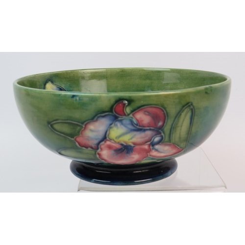 400 - Moorcroft bowl decorated with lillies to inside and out. 3 inches tall and 6 inches wide. Green Sign... 