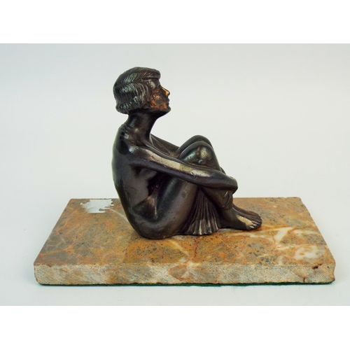 409 - Art Deco bronze alloy scultpture of a lady seated on a marble base.