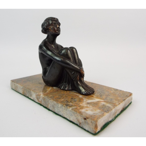 409 - Art Deco bronze alloy scultpture of a lady seated on a marble base.