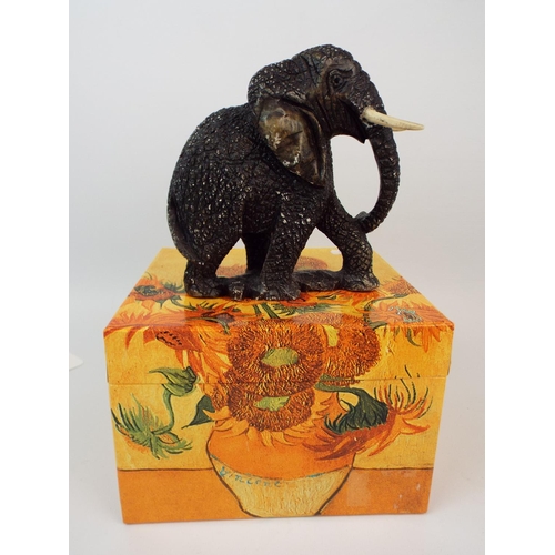 452 - Elephant figurine and a sunflower storage box.