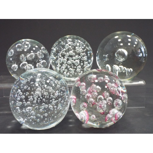 484 - 5 Large paperweights centered with bubbles.