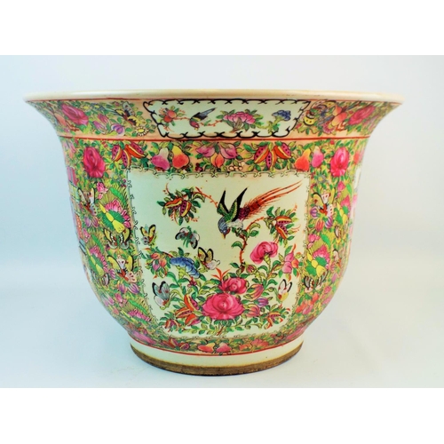 535 - Large oriental planter decorated with a family scene and butterflies, six character mark to the base... 