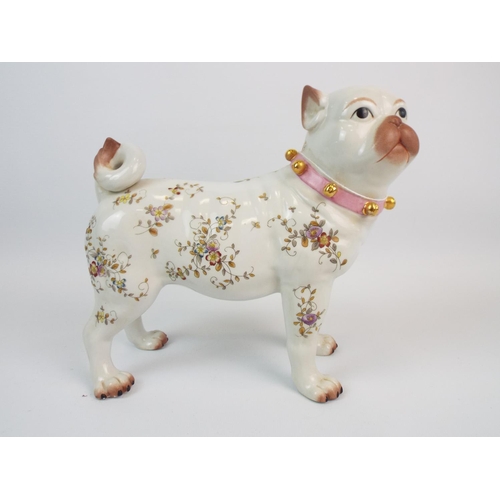 555 - Porcelain figurine of a Pug dog, standing 8