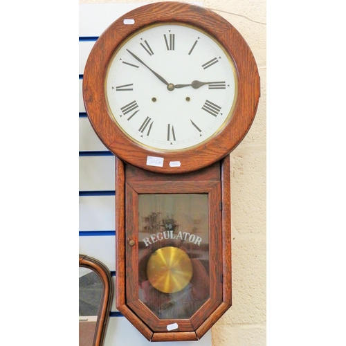 305A - American made Chiming regulator clock in very good working order. plain white face with Roman numera... 