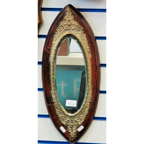 307A - Antique oval mirror with gilt decorations on oak base. Lovely oval bevelled glass to centre. approx ... 