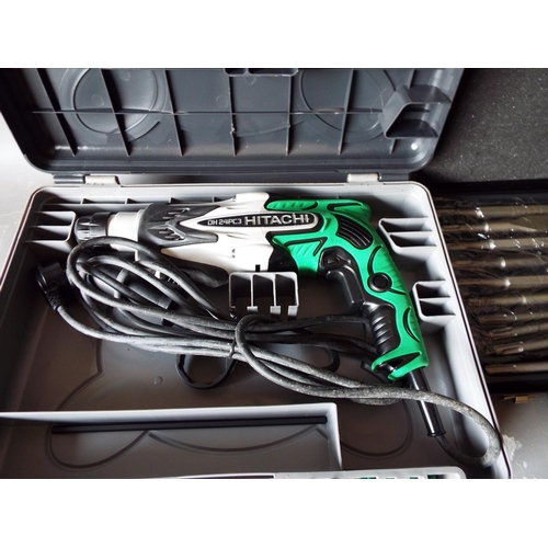 1336 - Hitachi KOKI 24mm rotary hammer drill plus a new set of drill bits.