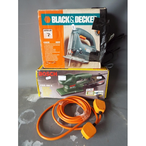 1341 - Black and decker jigsaw and a Bosh orbital sander plus an extension lead.