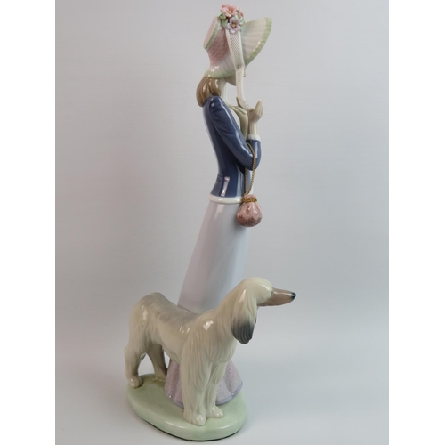 10 - Lladro Figurine 'Stepping Out' Model number 1537,  Measures approx 13.5 inches tall., original box. ... 