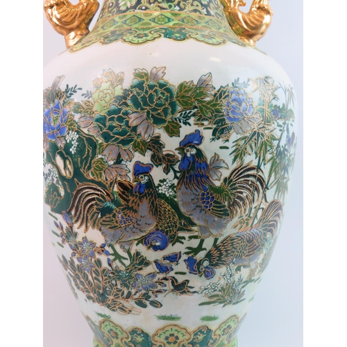 54 - Large Oriental vase decorated with transfer print fowls and poultry with hanbd applied gilt highligh... 