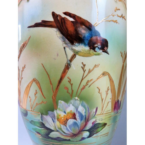 55 - Two Blushware Victorian vases, one with lid. Each decorated with birds and flowers. The largest bein... 