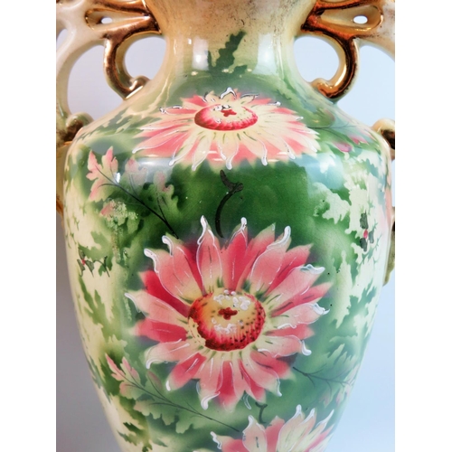 55 - Two Blushware Victorian vases, one with lid. Each decorated with birds and flowers. The largest bein... 