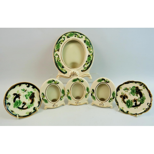 67 - Large Masons oval picture frame  plus two smaller together with Masons plates, dishes. All in the gr... 