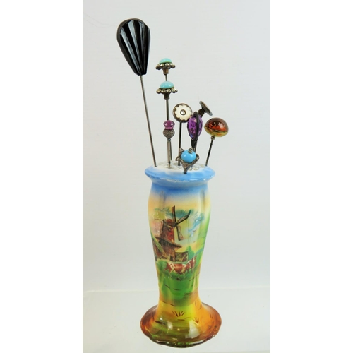 73 - Vintage Hatpin stand together with a collection of Nine hatpins, one of which has an Amber top. See ... 