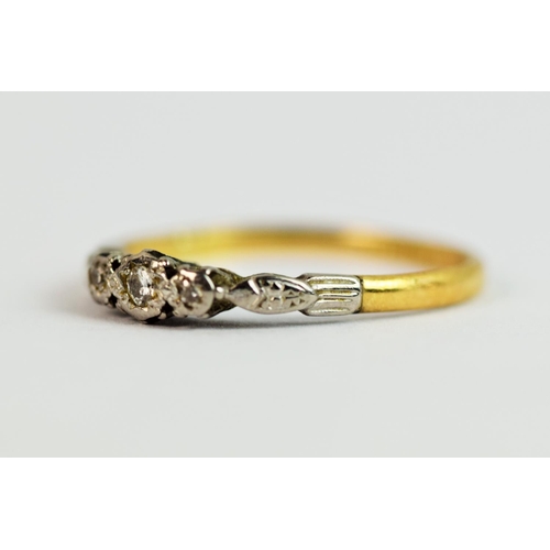 204 - 18ct Yellow Gold ring set with a Trilogy of Three Diamonds in Platinum mount. Finger size 'S-5'   2.... 