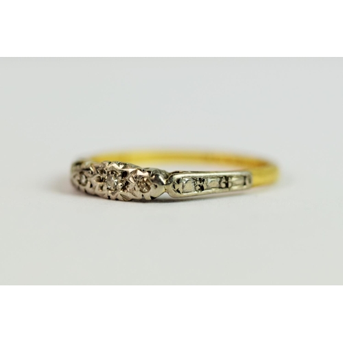 208 - 18ct Yellow Gold ring set with a Trilogy of Three Diamonds in Platinum mount. Finger size 'N'   2.0g... 