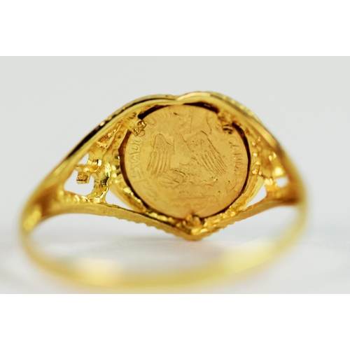 214 - 9ct Yellow Gold ring set with small Mexican Coin. (see photos)  Finger size 'O'    1.5g