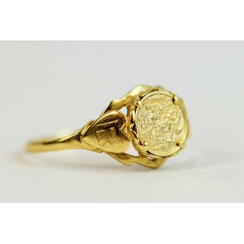 224 - 9ct Yellow Gold Signet ring with a fake metal coin in mount. Finger size 'Q-5'   1.5g