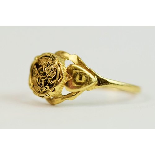 224 - 9ct Yellow Gold Signet ring with a fake metal coin in mount. Finger size 'Q-5'   1.5g