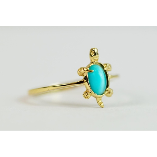 225 - 14ct Yellow Gold ring set with a pale blue oval stone.  In the shape of a turtle. Finger size 'K-5' ... 