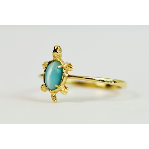 225 - 14ct Yellow Gold ring set with a pale blue oval stone.  In the shape of a turtle. Finger size 'K-5' ... 