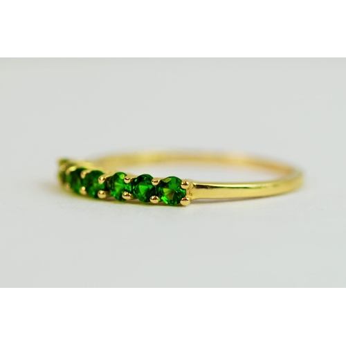 228 - 9ct  Yellow Gold ring set with an Oval Green stone. Finger size 'S-5'  1.9g