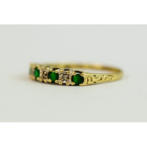 229 - Vintage 9ct Yellow Gold ring set with Emeralds and Diamonds.   Finger size 'Q'  1.3g