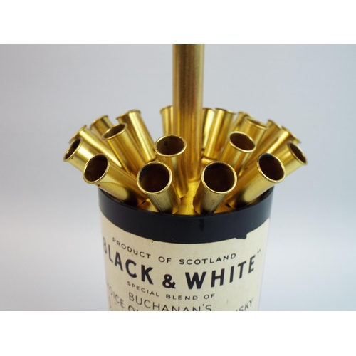 158 - Black & white whiskey novelty musical cigarette dispenser.