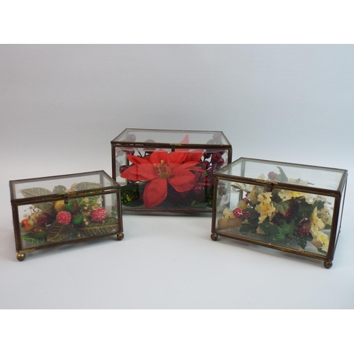 169 - Set of 3 french brass and glass trinket boxes with faux flowers within.