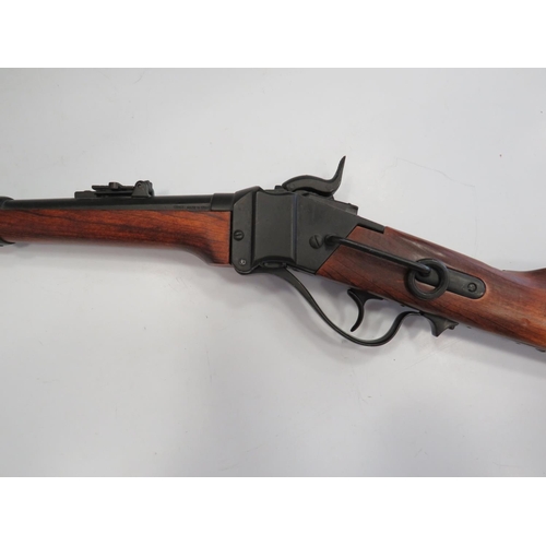 403 - Replica carbine rifle with cocking action and working trigger. Nice wooden stock. 39 inches long. Se... 